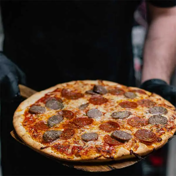 Up close photo of pizza out of the oven